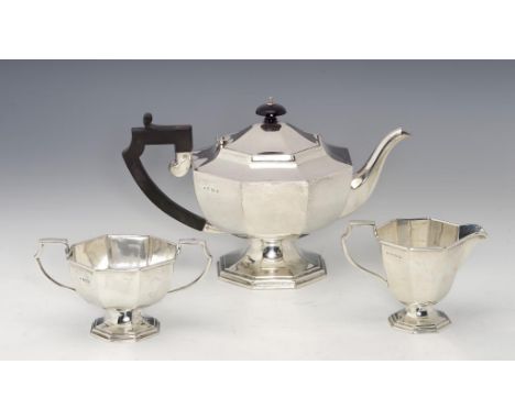 A GEORGE V OCTAGONAL SILVER TEA SERVICE  on pedestal foot, teapot 16cm h, by William Adams Ltd, Birmingham 1929 and 30, 32ozs