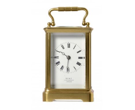 A FRENCH GILT BRASS CARRIAGE CLOCK, EARLY 20TH C  the enamel mask dial inscribed DENT COCKSPUR ST LONDON, the movement with p