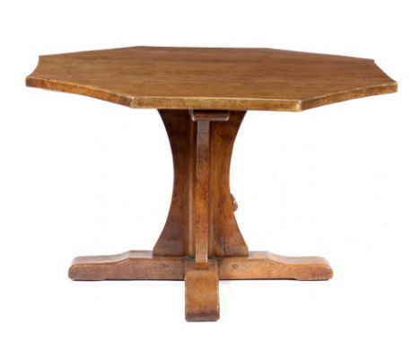 A MOUSEMAN OAK DINING TABLE, SECOND HALF 20TH C  the adzed three plank octagonal top with slightly concave sides, on incurved