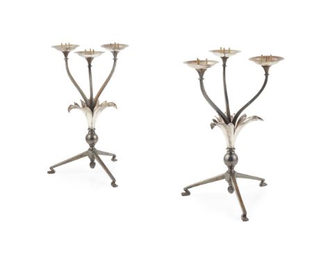 W.A.S. BENSON (1854-1924) PAIR OF THREE-LIGHT CANDLESTICKS, CIRCA 1900 no. 22A, silver-plated copper and patinated brass(35.6