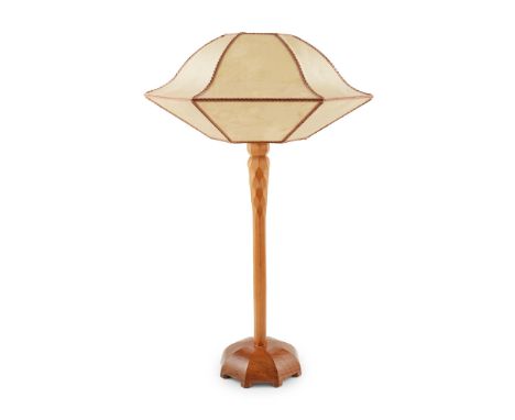 HUGH BIRKETT (1919-2002) TABLE LAMP, CIRCA 1950 walnut and yew, with sewn parchment shade(52.5cm (20 1/2in) high to fitting, 