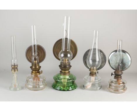 Five antique glass sconces with petroleum.&nbsp;First half 20th century.&nbsp;Dimensions: H 30 - 40 cm.&nbsp;In good conditio