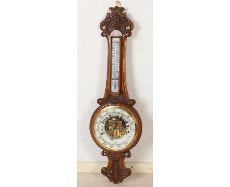 Antique English oak barometer with thermometer.&nbsp;Circa 1880. Size: 83 cm.&nbsp;In good condition.