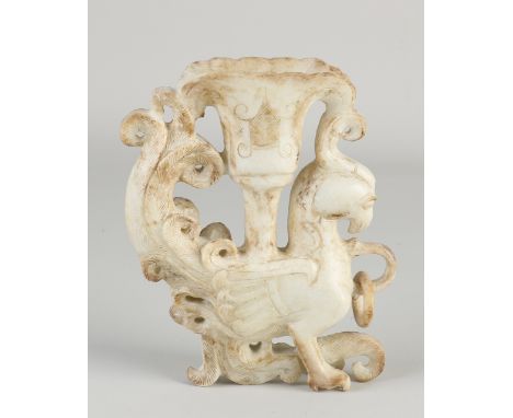 Old Chinese carved soapstone candlestick in the shape of a phoenix.&nbsp;Dimensions: 15 x 12 x 3&nbsp;cm.&nbsp;In good condit