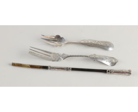 Two silver forks and a cigarette holder, 833/000.&nbsp;A ginger fork with a partly twisted handle and decorated with floral e