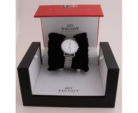 Steel Tissot watch, round model with date display.&nbsp;ø case 34mm.&nbsp;The watch is fitted with a fixoflex strap.&nbsp;In 
