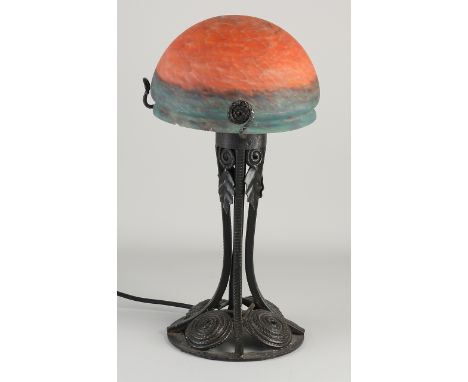 Old Jugendstil style wrought iron lamp with orange-green glass shade.&nbsp;20th century.&nbsp;Dimensions: H 41 cm.&nbsp;In go