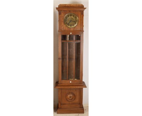 Antique German oak longcase clock with mother-of-pearl inlay, brass weights, pendulum and clockwork.&nbsp;Circa 1910. Art Nou