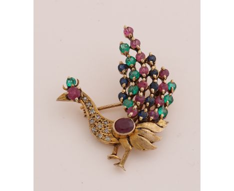 Beautiful yellow gold peacock brooch, 585/000, with diamond ruby, sapphire and emerald.&nbsp;Brooch in the shape of a bird wi