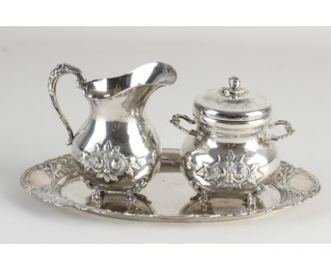 Silver cream set, 800/000, with a creamer, sugar bowl and a leaf.&nbsp;The milk jug and sugar bowl are decorated with rose de