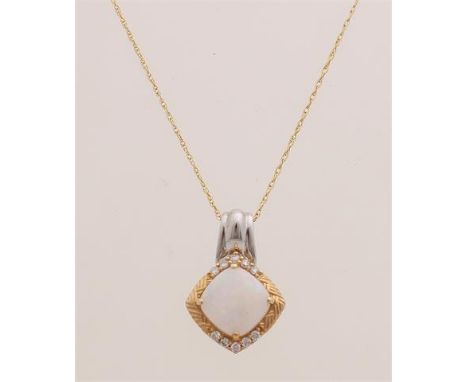 Gold pendant with opal, 585/000, with opal and diamond.&nbsp;Pendant with a yellow gold diamond-shaped setting with white opa