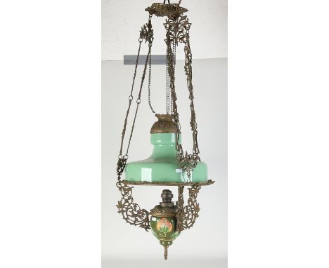 Jugendstil majolica hanging petroleum lamp with green glass shade.&nbsp;20th century.&nbsp;Dimensions: 60 x Ø 44 cm.&nbsp;In 