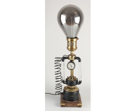 Separate home-built lamp.&nbsp;Made of wood and brass + large light bulb.&nbsp;20th century.&nbsp;Dimensions: H 63 cm.&nbsp;I