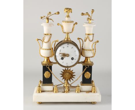 French marble mantel clock with gilt bronze in Louis Seize style.&nbsp;Circa 1870. Eight-day movement, half-hourly strike and
