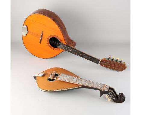 Two old musical instruments.&nbsp;20th century.&nbsp;(1) Mandolin Roca Esclando 25 Spain.&nbsp;(2) Mandolin with mother-of-pe