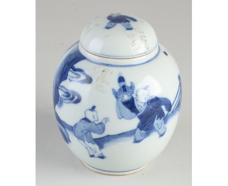 Chinese porcelain tea caddy with playing fools in a garden decor.&nbsp;Six characters bottom mark.&nbsp;Baking error lid.&nbs