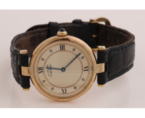 Must de cartier watch, gold on silver, 925/000, quartz, round model with a light yellow dial with blue ionized hands.&nbsp;At