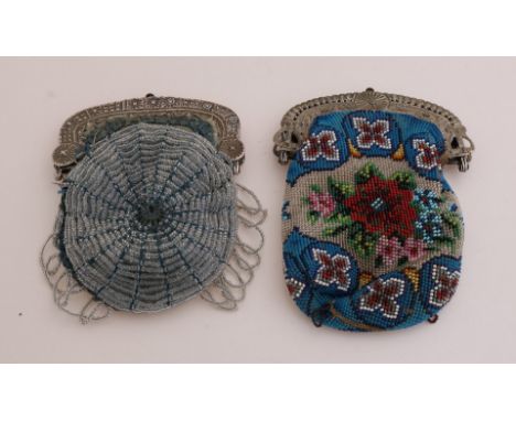 Two beaded bags with silver clasp, 833/000.&nbsp;Bag with floral beaded decor with a silver bracket decorated with harp and f