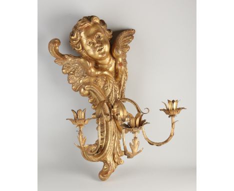 Large wood-carved, gold-plated 3-light wall sconce.&nbsp;Dimensions: 65 x 46 x 39 cm.&nbsp;In good condition.