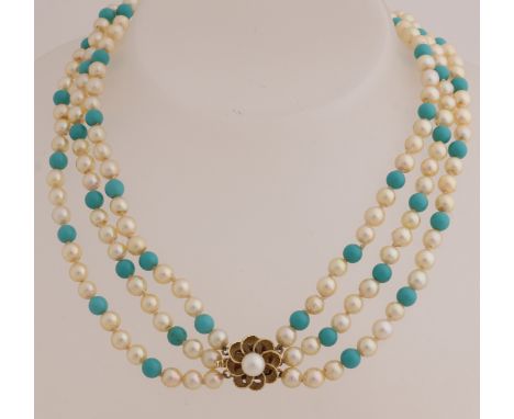Necklace with 3 rows of cultured pearls, ø 5mm, and turquoise beads, attached to a yellow gold clasp, 585/000, in a flower sh