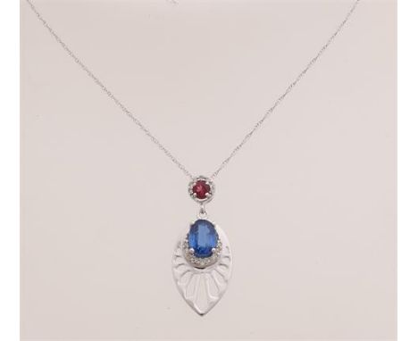 White gold pendant, 585/000, with kyanite, ruby ??and diamond.&nbsp;Leaf-shaped pendant, decorated with an oval faceted kyani