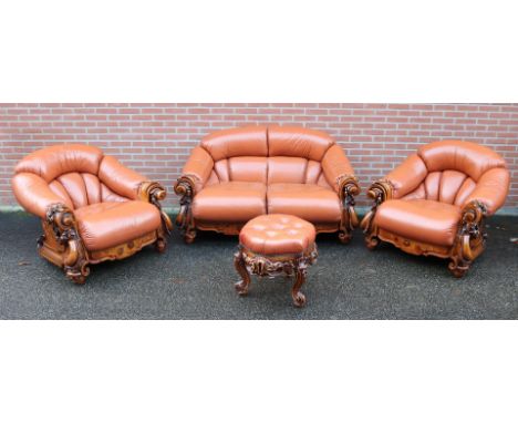 Four-piece Italian leather couch in cognac color.&nbsp;Consisting of: Two-seater sofa, and two times one seater + ottoman.&nb