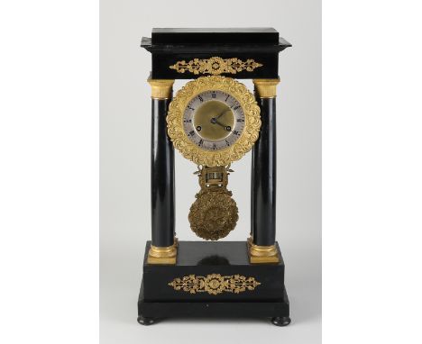 19th century mahogany French column mantel clock.&nbsp;Ebonized.&nbsp;Empire.&nbsp;Circa 1830. Eight-day movement, half-hourl