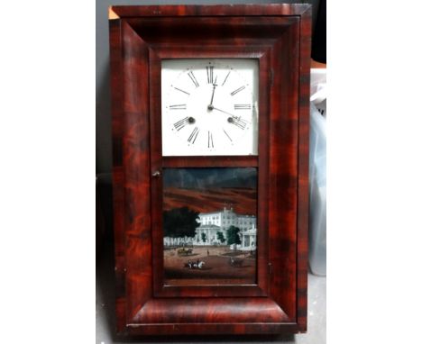 A late 19th century American wall clock - by E. N. Welch, with a rectangular mahogany case, the door fitted with a print depi