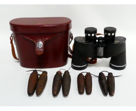 A pair of 20th century binoculars by Swift - 8.5x44, in a brown leather case, together with four pairs of pine cone cuckoo cl