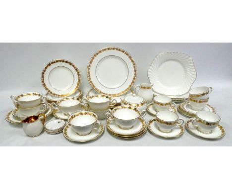 A Wedgwood part dinner service - 'Whitehall' pattern comprising five cups, four saucers, seven soup cups with saucers, six si