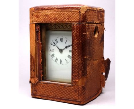 An early 20th century carriage timepiece - the case with fluted columns and pierced panels set with bevelled glass, the ename
