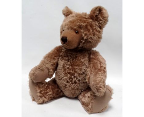 A Steiff articulated teddy bear - with growler and button to ear, height 60cm. 