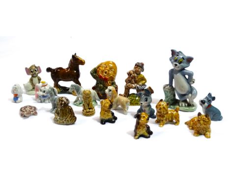 A collection of nineteen Wade figures - including Tom &amp; Jerry, Disney characters and others (19).