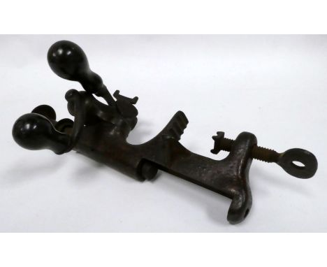 George Jeffries of Norwich - a bench mounted 12 bore cartridge reloading tool, with turned wooden handles and brass fittings,