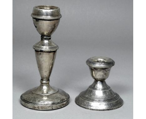 A silver filled candlestick - Birmingham 1937, John Rose, height 12cm, together with another height 5.5cm. 