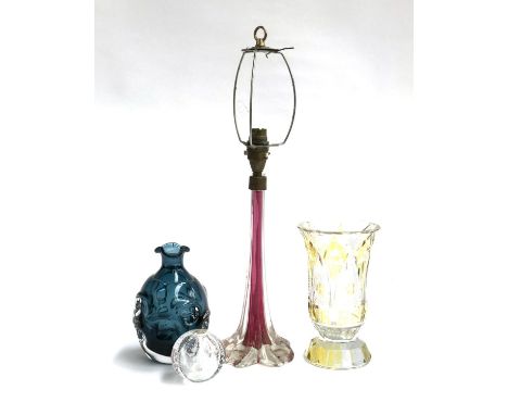 A cranberry glass table lamp, height to base of fitting 27cmL; yellow bohemian cut glass vase; small bubble glass vase/paperw