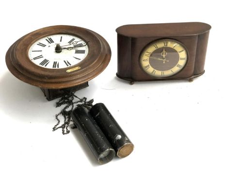A bracket clock, the dial with Roman numerals, 26cmW overall; together with an 8 day mantel clock 