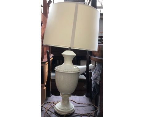 A ceramic table lamp of baluster form, 68cmH to top of shade 