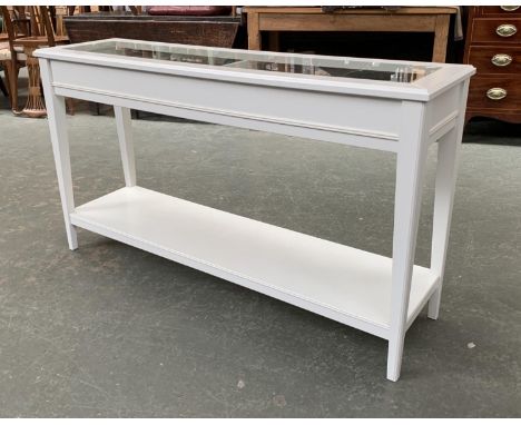 A contemporary white painted console table, glass inset top with shelf below, on square tapered legs, joined by undershelf, 1