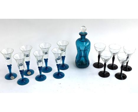 A set of 7 Kastrup Holmegaard, Denmark blue stemmed glasses, 12.5cmH, together with a Illums Bolighus dimple bottle, 19cmH an