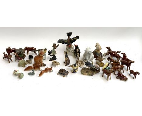 A mixed lot of ceramic animal figurines to include Crown Staffordshire, Royal Worcester, USSR, Lladro, Goebel, Watership 'Bla
