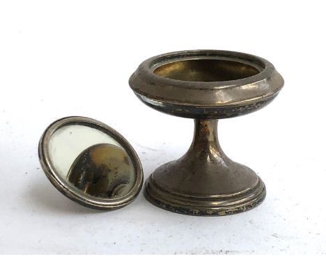 An Art Deco miniature silver stemmed compact with mirrored lid, by Joseph Gloster, Birmingham 1924; together with two crested