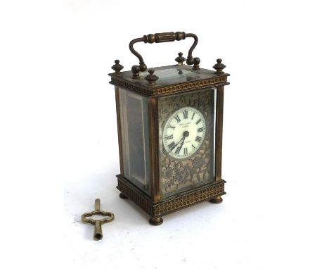 A Drew &amp; Sons London, made in Paris, carriage clock, enamel dial with Roman numerals, with fretwork floral decoration, ap