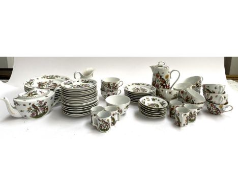 An Austrian part tea, coffee and breakfast service decorated with pheasants and butterflies amongst flowering trees and branc