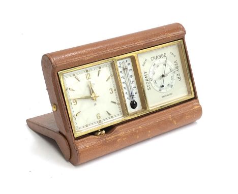 An Angelus Sentry leather cased travelling desk clock, thermometer and barometer, embossed F.M Linthouse 1959, 14.5cmW 