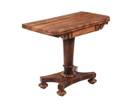 A William IV rosewood card table, c.1830, the hinged revolving to enclosing a circular baize inset, 91cm wide, 45cm deep, 74c