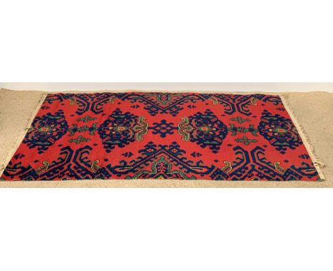 VINTAGE WOOLLEN RUG, red and blue with central repeating pattern, 92 x 192cms