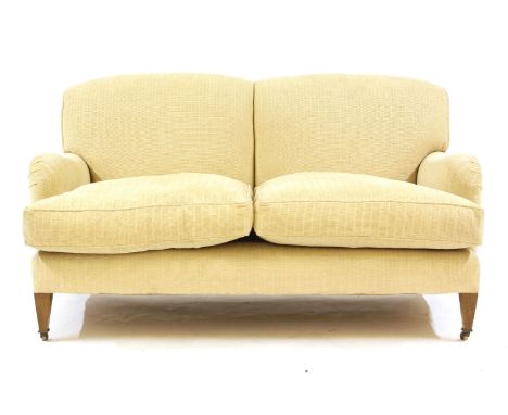 A modern two seater sofa, in the manner of Howard & Sons, in cream chenille fabric, 150cm wide, 93cm deep, 84cm high