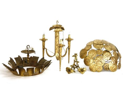 A collection of cut metal, and embossed light fittings