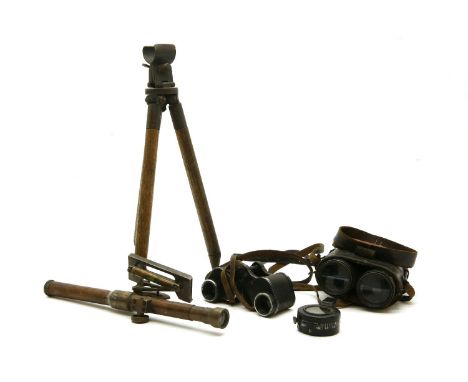 A 1942 MKII compass, a 1915 signal tel stand and two binoculars and a level